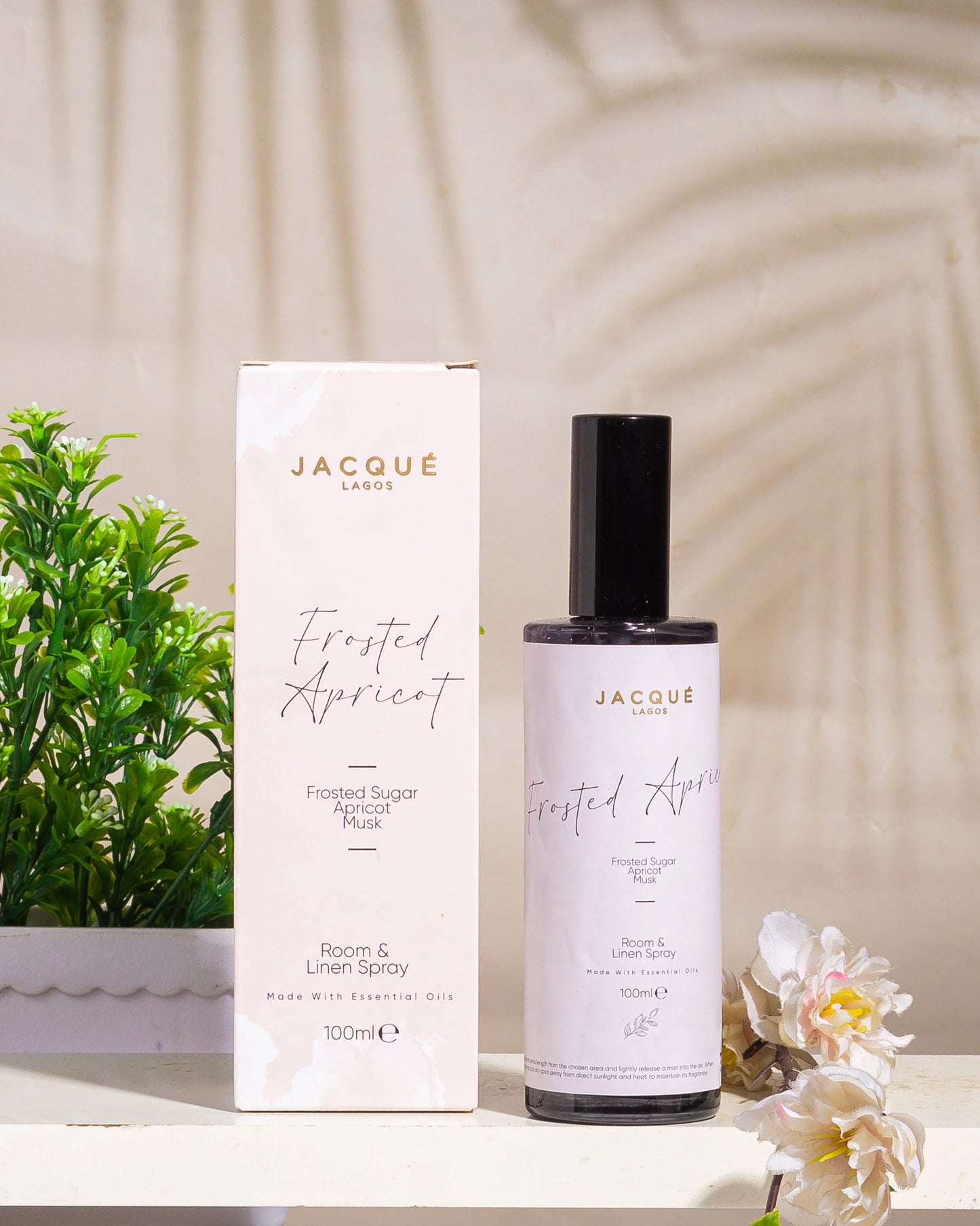 frosted apricot spray with off-white packaging