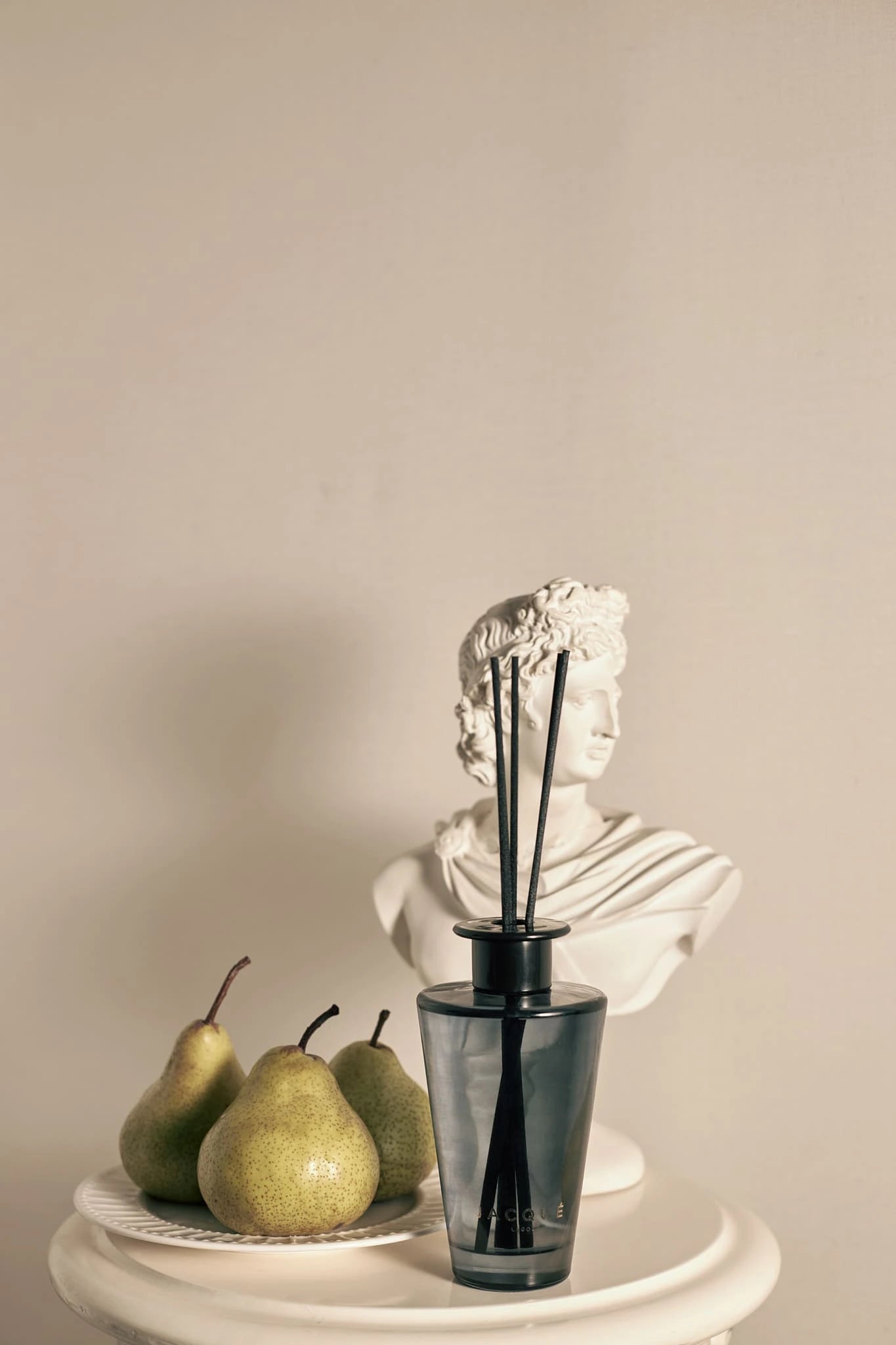 English pear diffuser on stand with sculpture